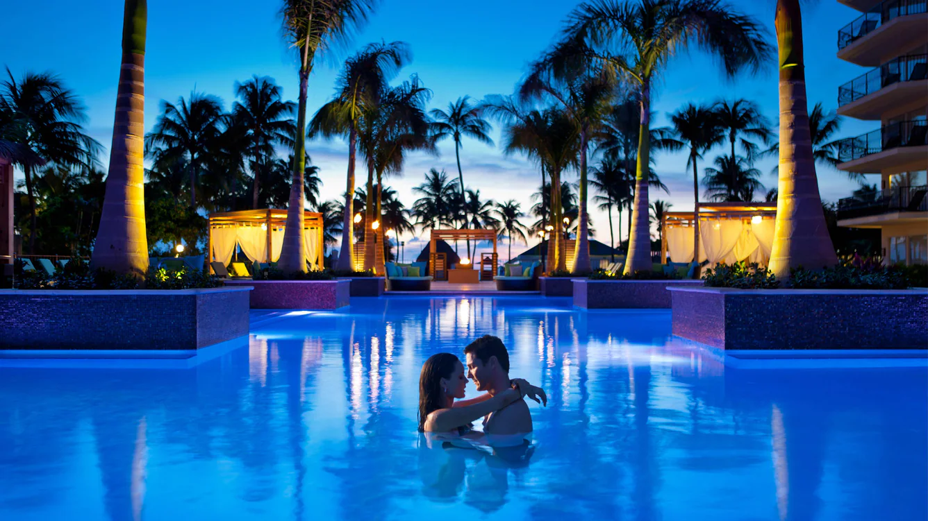 Resort pool with cabanas